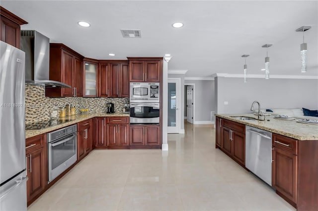 2635 SW 183rd Ave, Miramar, FL 33029 - kitchen with appliances with stainless steel finishes, wall chimney range hood, reddish brown cabinets, ornamental molding, and decorative backsplash