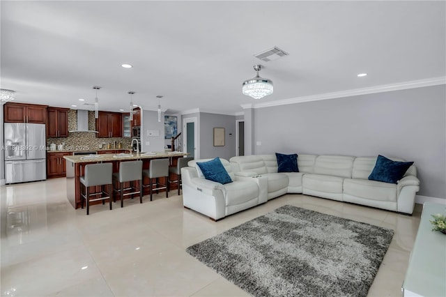2635 SW 183rd Ave, Miramar, FL 33029 - living room featuring crown molding, recessed lighting, and light tile patterned floors
