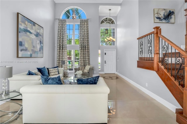 2635 SW 183rd Ave, Miramar, FL 33029 - living area featuring a towering ceiling and stairs