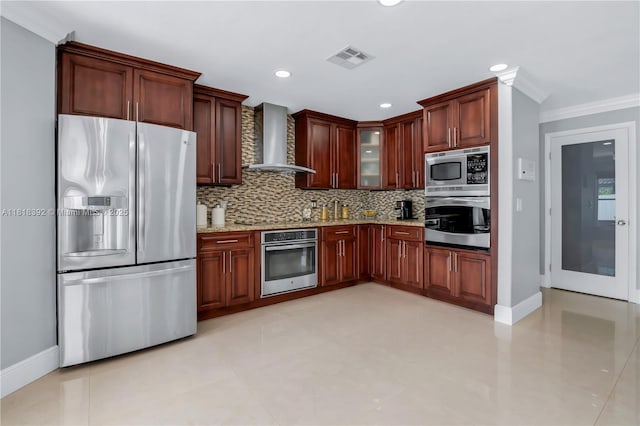 2635 SW 183rd Ave, Miramar, FL 33029 - kitchen featuring stainless steel appliances, wall chimney range hood, decorative backsplash, ornamental molding, and light stone countertops