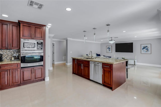2635 SW 183rd Ave, Miramar, FL 33029 - kitchen featuring appliances with stainless steel finishes, dark brown cabinets, ornamental molding, recessed lighting, and tasteful backsplash
