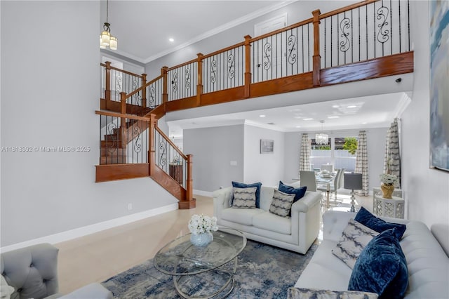 2635 SW 183rd Ave, Miramar, FL 33029 - living area with crown molding, stairs, a high ceiling, a chandelier, and recessed lighting