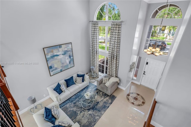 2635 SW 183rd Ave, Miramar, FL 33029 - living area with a towering ceiling and a chandelier