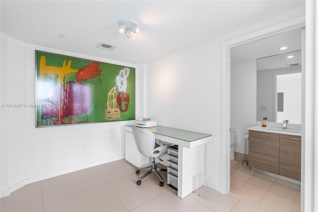 1300 S Miami Ave Unit 2305, Miami, FL 33130 - home office with a sink, recessed lighting, baseboards, and light tile patterned floors