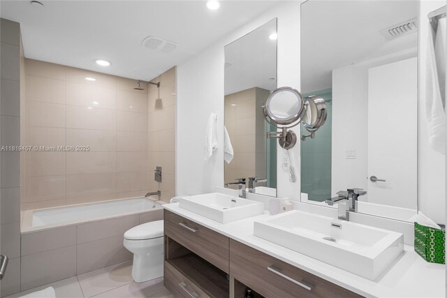 1300 S Miami Ave Unit 2305, Miami, FL 33130 - full bathroom with tiled shower / bath, toilet, double vanity, tile patterned floors, and recessed lighting