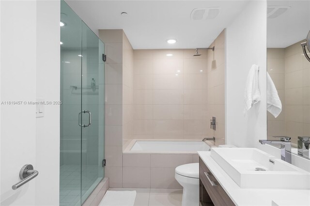 1300 S Miami Ave Unit 2305, Miami, FL 33130 - full bathroom with a tile shower, vanity, tiled tub, toilet, and tile patterned floors