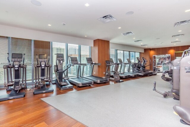 1300 S Miami Ave Unit 2305, Miami, FL 33130 - gym with wood finished floors and wood walls