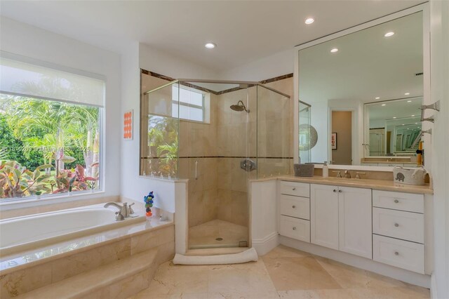 9532 SW 124th Ter, Miami, FL 33176 - bathroom with a bath, vanity, a shower stall, recessed lighting, and marble finish flooring