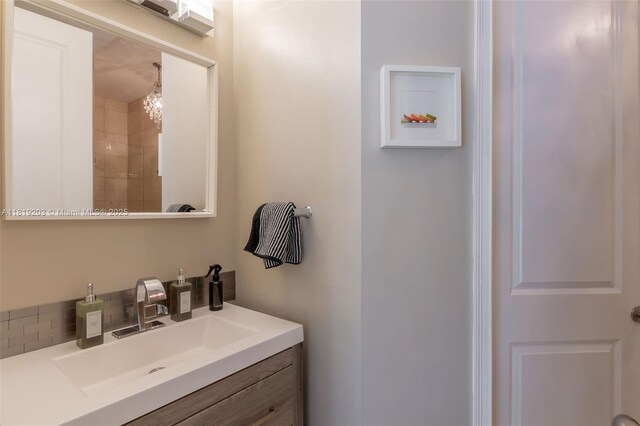 9532 SW 124th Ter, Miami, FL 33176 - bathroom featuring vanity and backsplash