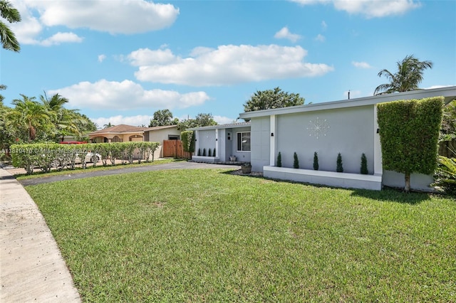2375 NW 81st Ave, Sunrise, FL 33322 - view of front of house featuring stucco siding and driveway