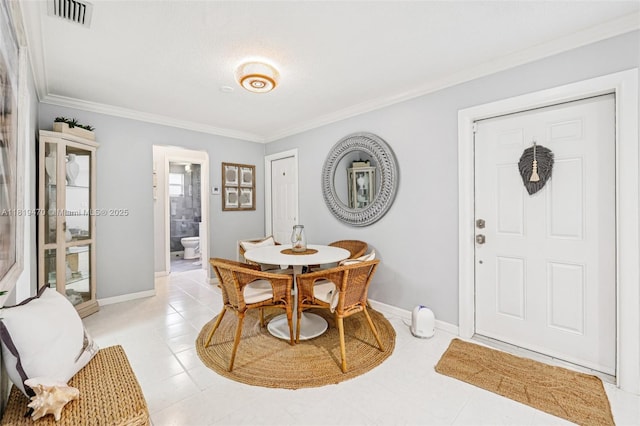2375 NW 81st Ave, Sunrise, FL 33322 - dining area featuring crown molding and baseboards