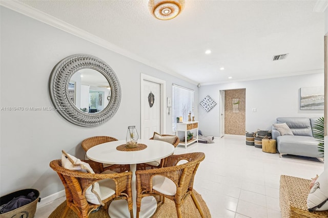 2375 NW 81st Ave, Sunrise, FL 33322 - tiled dining space featuring crown molding and recessed lighting