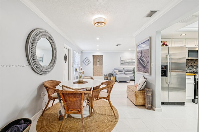 2375 NW 81st Ave, Sunrise, FL 33322 - dining room featuring crown molding, light tile patterned floors, and recessed lighting
