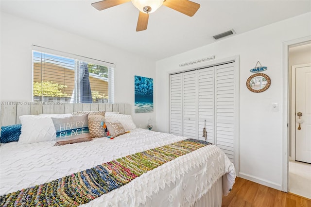 2375 NW 81st Ave, Sunrise, FL 33322 - bedroom featuring light wood-type flooring, a closet, and a ceiling fan