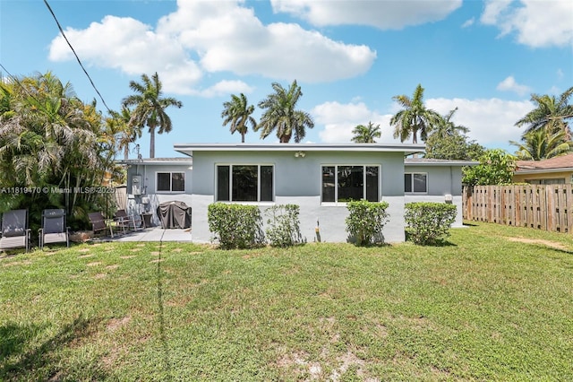 2375 NW 81st Ave, Sunrise, FL 33322 - back of house featuring stucco siding and a patio area