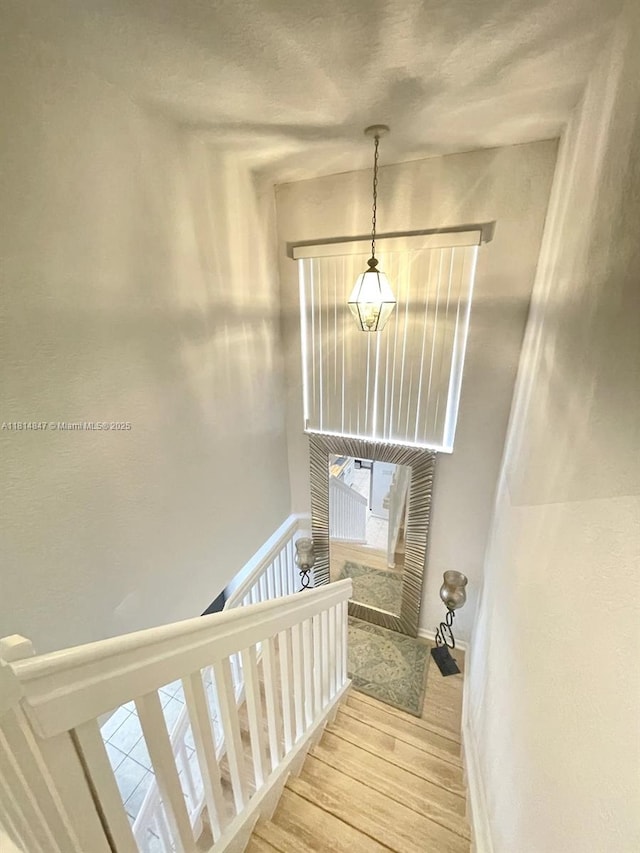 18796 SW 27th Ct, Miramar, FL 33029 - stairway with wood finished floors and baseboards