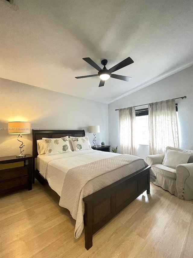18796 SW 27th Ct, Miramar, FL 33029 - bedroom with light wood-style flooring, lofted ceiling, and a ceiling fan