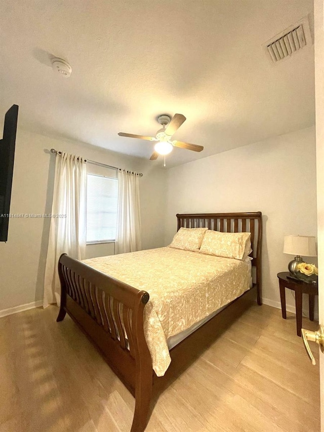 18796 SW 27th Ct, Miramar, FL 33029 - bedroom with light wood-style flooring, baseboards, and a ceiling fan