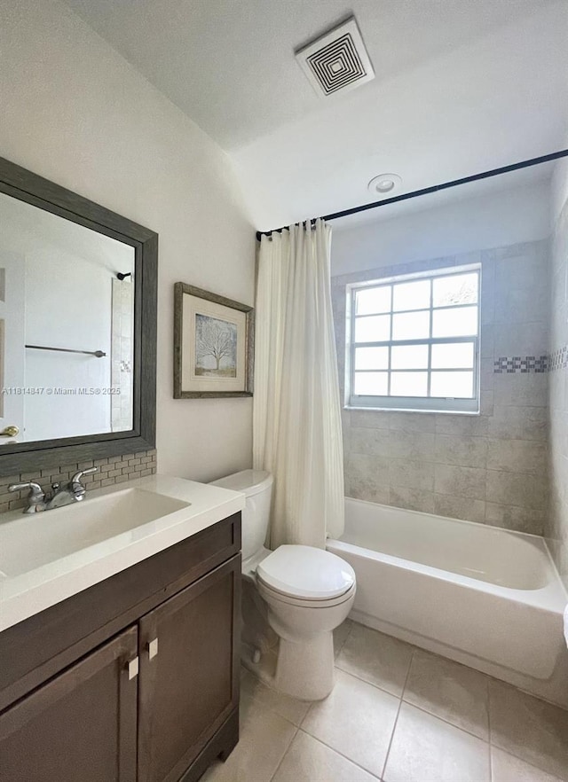 18796 SW 27th Ct, Miramar, FL 33029 - bathroom featuring toilet, vanity, tile patterned floors, and shower / bath combo
