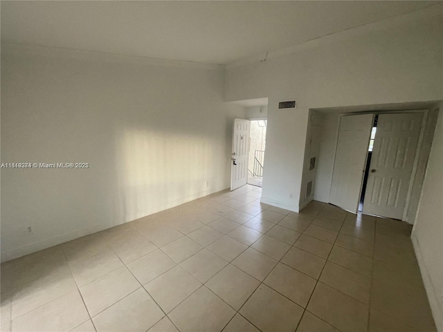 4011 NW 87th Ave Unit 4011, Sunrise, FL 33351 - empty room with light tile patterned flooring and baseboards