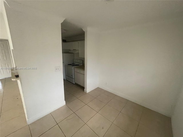 4011 NW 87th Ave Unit 4011, Sunrise, FL 33351 - unfurnished room featuring light tile patterned floors and baseboards