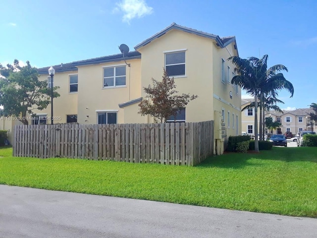 134 SE 28th Ter Unit 21, Homestead, FL 33033 - view of home's exterior with stucco siding