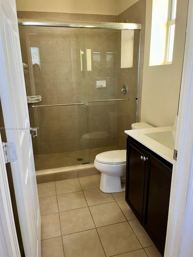 134 SE 28th Ter Unit 21, Homestead, FL 33033 - full bath featuring vanity, a stall shower, and tile patterned floors