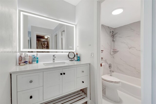 3015 N Ocean Blvd Unit 4K, Fort Lauderdale, FL 33308 - bathroom with vanity, toilet, and washtub / shower combination