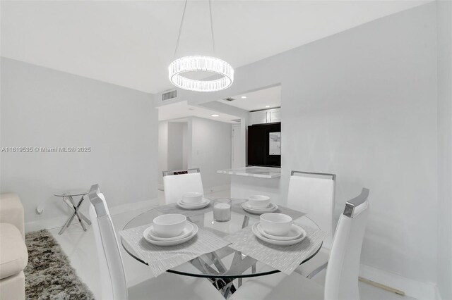 3015 N Ocean Blvd Unit 4K, Fort Lauderdale, FL 33308 - dining space with baseboards
