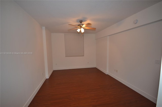 400 N Federal Hwy Unit 302S, Boynton Beach, FL 33435 - unfurnished room featuring ceiling fan, dark wood finished floors, baseboards, and a smoke detector