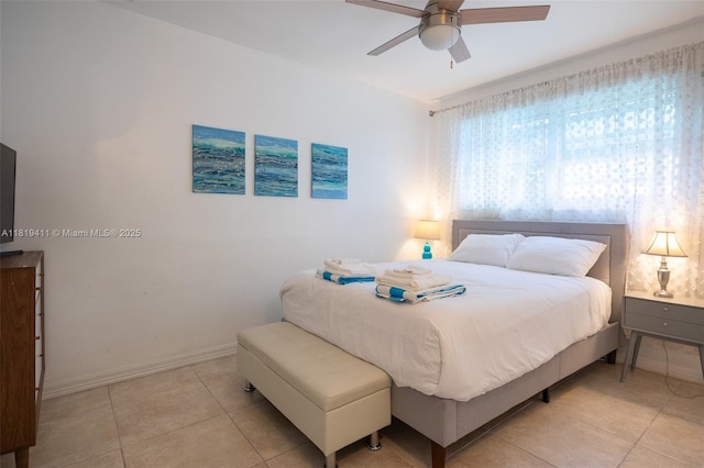 806 Argonaut Is, Dania Beach, FL 33004 - bedroom featuring light tile patterned flooring, baseboards, and ceiling fan