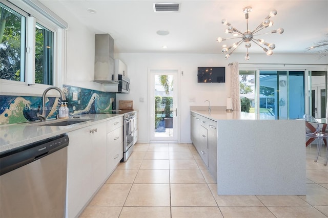 806 Argonaut Is, Dania Beach, FL 33004 - kitchen featuring appliances with stainless steel finishes, a sink, a peninsula, a chandelier, and recessed lighting