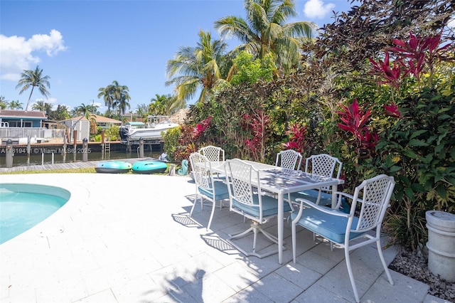 806 Argonaut Is, Dania Beach, FL 33004 - view of swimming pool with a patio, outdoor dining area, and a boat dock