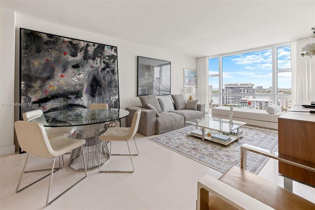 6801 Collins Ave Unit 1401, Door Number Miami Beach, FL 33141 - living room featuring a wall of windows and a view of city