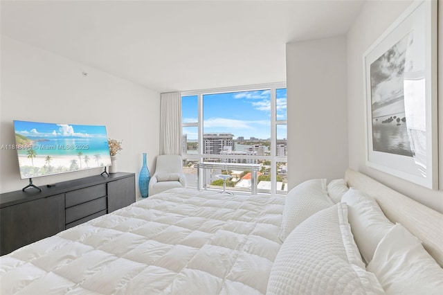 6801 Collins Ave Unit 1401, Door Number Miami Beach, FL 33141 - bedroom with expansive windows