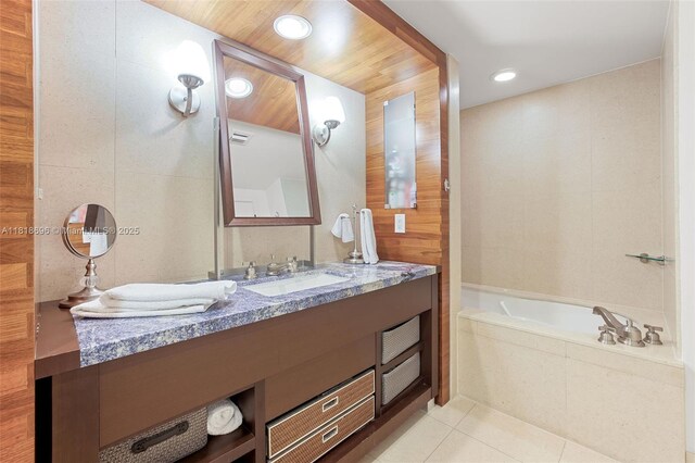 6801 Collins Ave Unit 1401, Door Number Miami Beach, FL 33141 - full bath featuring a garden tub, tile patterned flooring, vanity, and recessed lighting