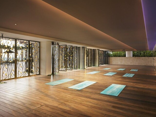 6801 Collins Ave Unit 1401, Door Number Miami Beach, FL 33141 - gym featuring wood-type flooring