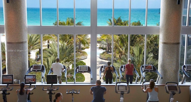 6801 Collins Ave Unit 1401, Door Number Miami Beach, FL 33141 - gym featuring a water view