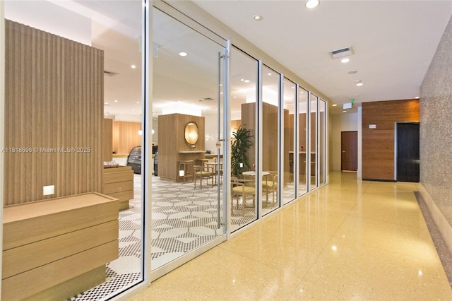 6801 Collins Ave Unit 1401, Door Number Miami Beach, FL 33141 - corridor with wood walls