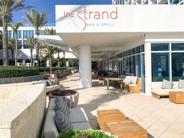 6801 Collins Ave Unit 1401, Door Number Miami Beach, FL 33141 - exterior space with outdoor lounge area and a patio