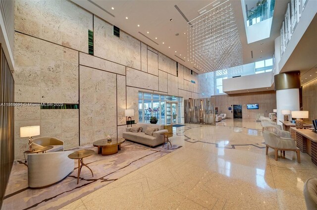 6801 Collins Ave Unit 1401, Door Number Miami Beach, FL 33141 - lobby with a towering ceiling and recessed lighting