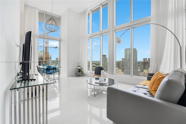485 Brickell Ave Unit 4004, Miami, FL 33131 - tiled living room with a high ceiling and a chandelier