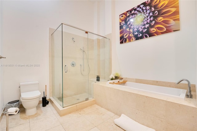 485 Brickell Ave Unit 4004, Miami, FL 33131 - full bathroom with a garden tub, a stall shower, and tile patterned flooring