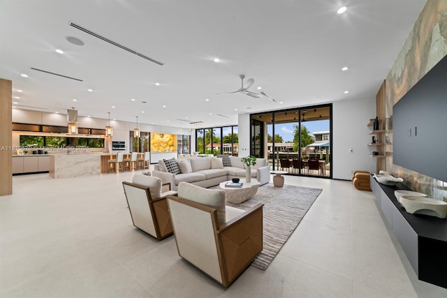 2033 NE 22nd St, Wilton Manors, FL 33305 - living room with recessed lighting and expansive windows