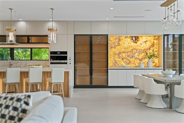 2033 NE 22nd St, Wilton Manors, FL 33305 - dining area featuring recessed lighting