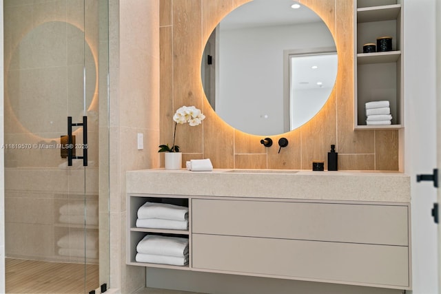 2033 NE 22nd St, Wilton Manors, FL 33305 - bathroom featuring vanity, a stall shower, and built in features