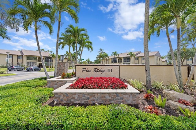 311 Pine Ridge Cir Unit C-2, Green Acres, FL 33463 - community sign featuring a residential view
