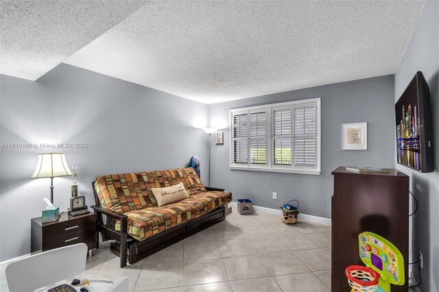 16171 Blatt Blvd Unit 401, Weston, FL 33326 - living area featuring a textured ceiling, tile patterned floors, and baseboards
