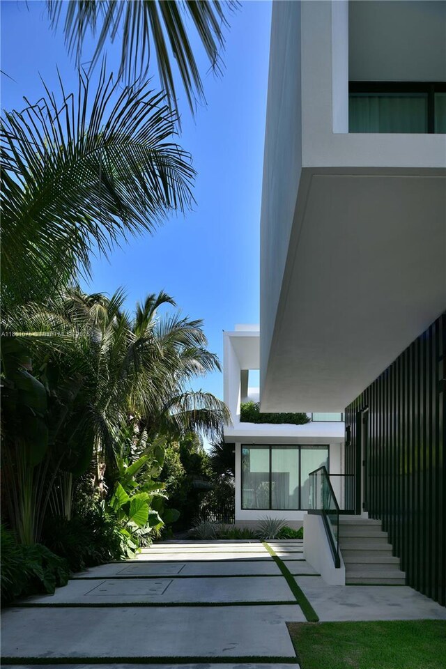 375 N Hibiscus Dr, Miami Beach, FL 33139 - exterior space featuring stucco siding