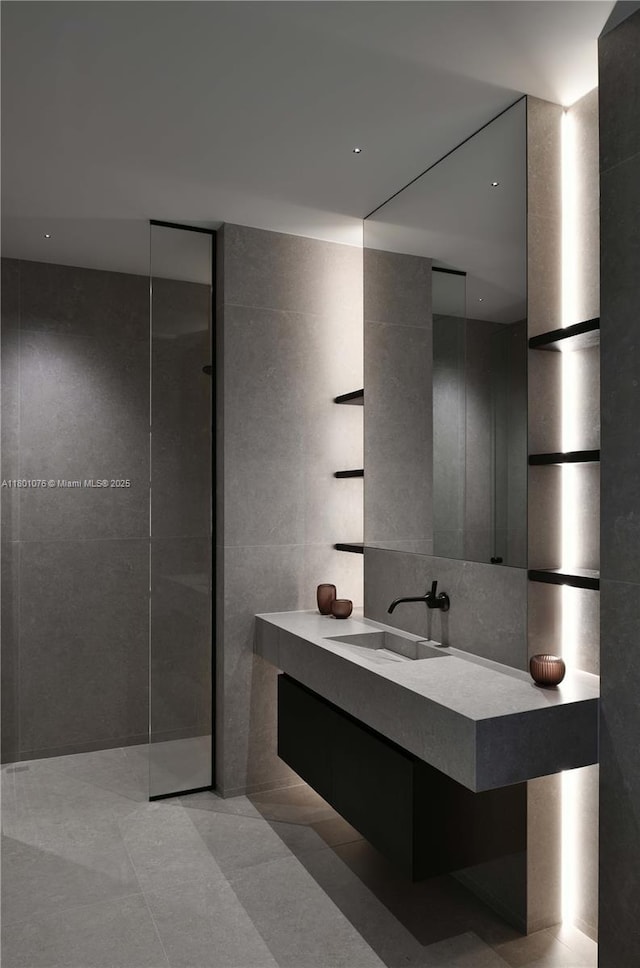 375 N Hibiscus Dr, Miami Beach, FL 33139 - bathroom featuring vanity and tile walls
